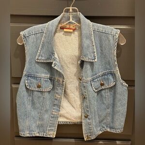Vintage Style New York sleeveless cropped denim jacket.